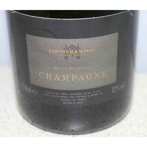 1675 - A bottle of Fortnum & Mason champagne in display box, 750ml