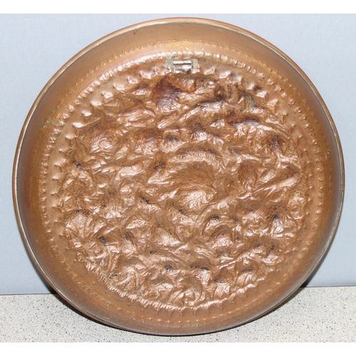 1796 - A superb quality vintage Indian embossed copper tray depicting birds and foliage, approx 28cm in dia... 