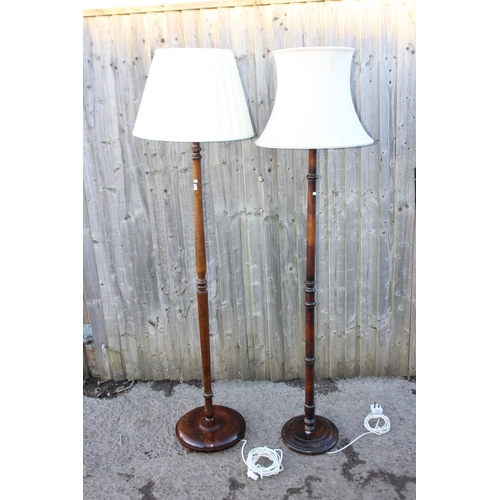 253 - 2 vintage turned wooden standard lamps with shades