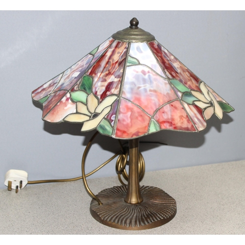 255 - A Tiffany style table lamp with leaded coloured glass shade and bronzed metal base, approx 43cm tall