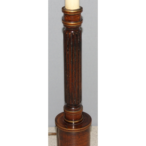 258 - An antique style turned wooden table lamp with gilt details, with shade, approx 65cm tall