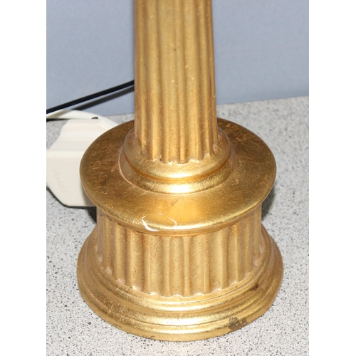 261 - A gilt glazed ceramic column table lamp, with shade, approx 52cm tall