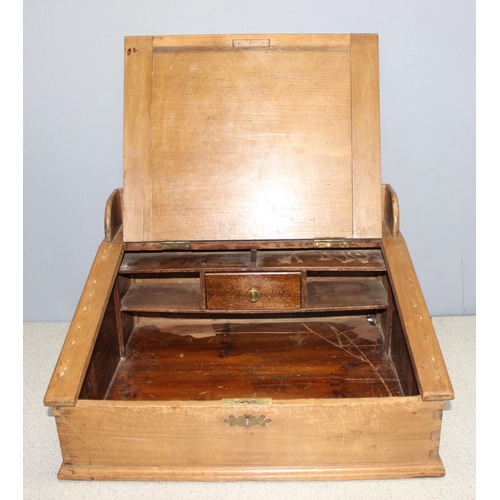 290 - A vintage wooden clerks desk with lift up lid, approx 51cm wide x 48cm deep x 28cm tall