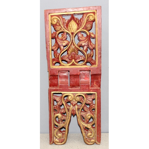 293 - A vintage red and gilt folding bookrest, possibly Chinese, approx 53cm wide when open