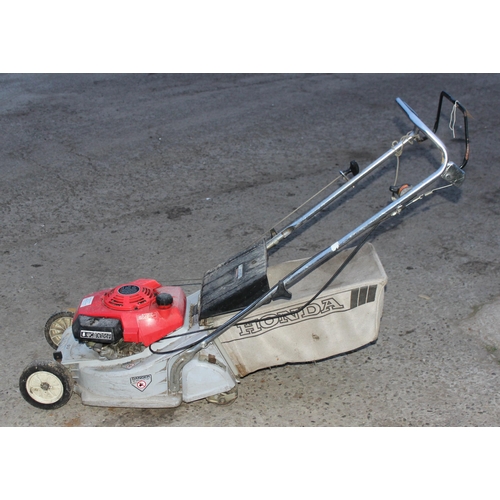 311 - Honda HR173 petrol lawn mower with box