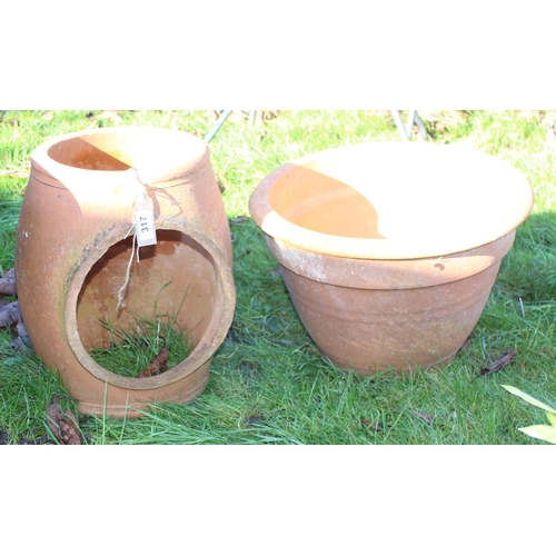 317 - 3 terracotta garden pots, the largest approx 40cm wide