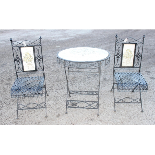 318 - Folding metal patio table and 2 chairs, the table approx 64cm wide