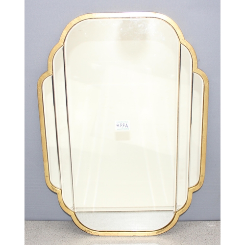 499A - An Art Deco style cloud shaped mirror with gilt frame, approx 61cm x 42cm