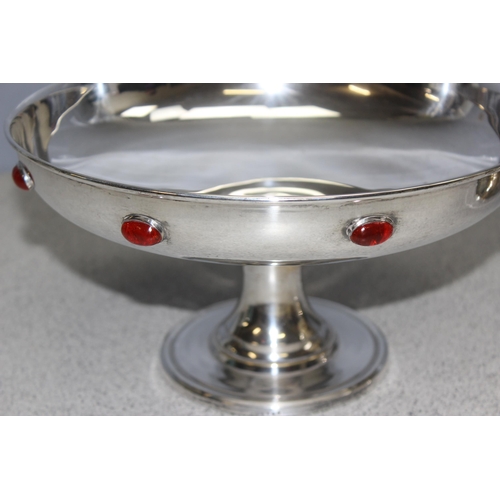 1045 - In the manner of Liberty, a pair of Arts and Crafts period silver plated comports or tazzas with cab... 