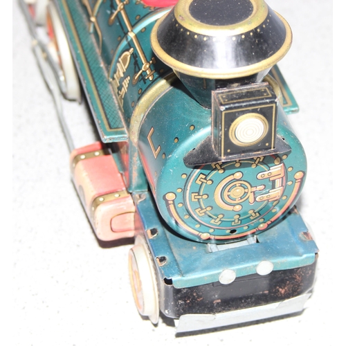 1532 - Vintage tinplate battery operated toy train