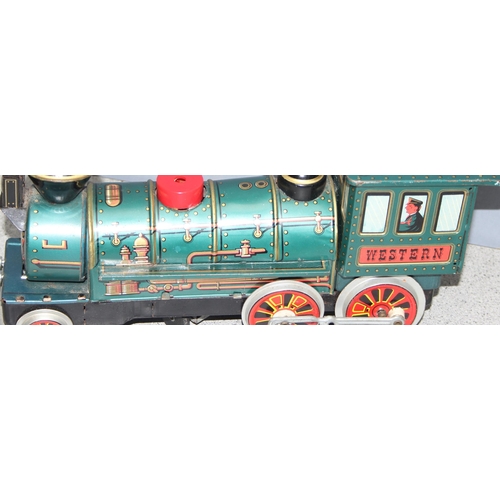 1532 - Vintage tinplate battery operated toy train