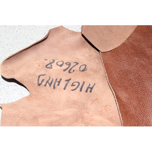 216 - Brown leather/hide, approx 2mm thick, 140 x 125cm at widest points