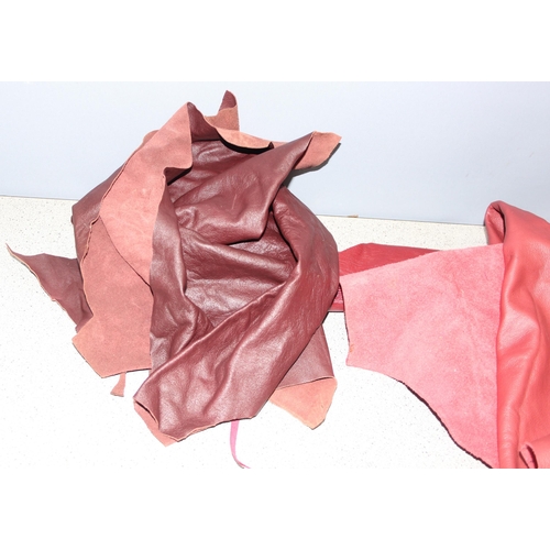 223 - Qty material offcuts in different shades of red to incl leather and suede, various thickness