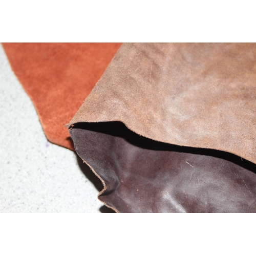 224 - Qty of leather offcuts of various thickness/shades of tan/brown