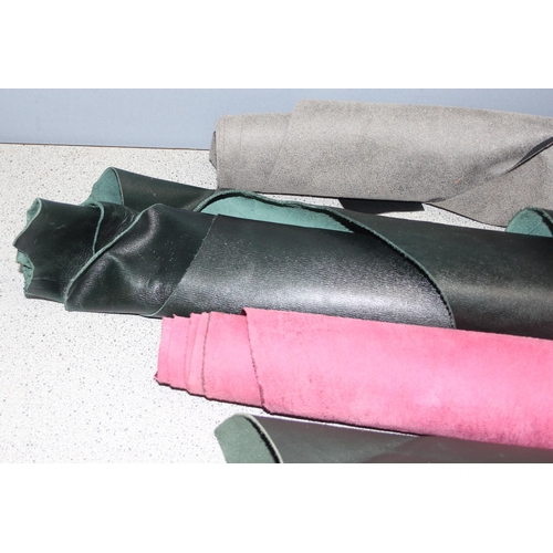 228 - Qty of mixed material small rolls/offcuts, mostly leather of various colours and thickness