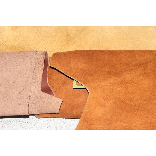 229 - Qty of mixed material small rolls/offcuts, mostly leather, various thickness and shades of brown