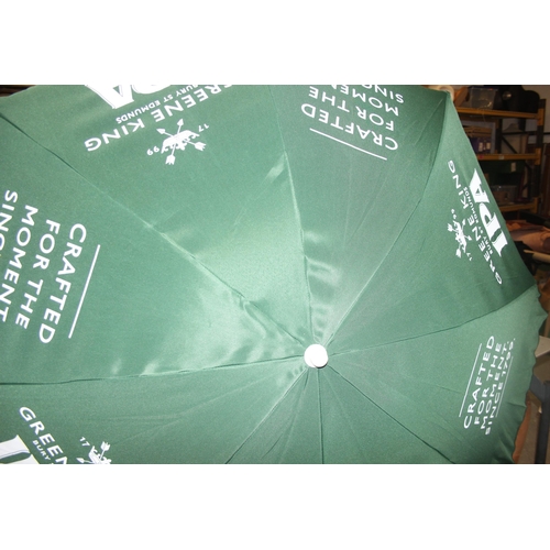 315 - 6 x Greene King IPA garden table parasols in green, seemingly unused