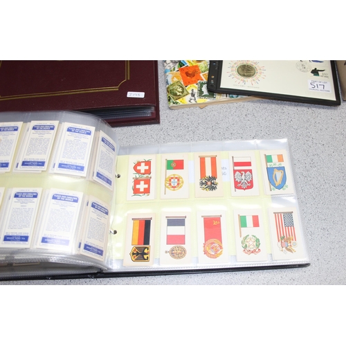 517 - Qty of mixed stamps, First Day Covers, picture/tea cards in album and postcards etc