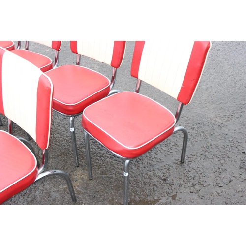 28 - A set of 6 1950's style cream and red leather effect chairs with chrome bases