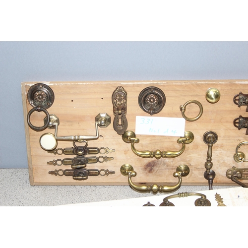 829 - Qty of assorted drawer handles mounted on boards (4)