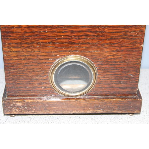 1306 - Mahogany cased mechanical mantel clock, approx 33cm tall