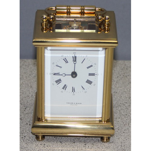 1307 - Boxed brass skeleton 11 jewels carriage clock by Taylor & Blight, with key, inscription to base