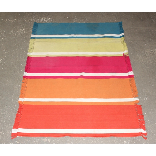 229A - A highly decorative retro style colourful flat weave kilim style rug, approx 122cm x 180cm