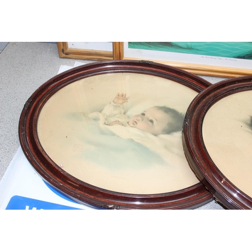 499K - Qty of prints to include 2 oval frames prints of babies and 3 underwater themes prints, a mirror and... 