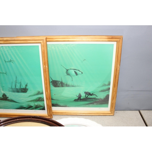 499K - Qty of prints to include 2 oval frames prints of babies and 3 underwater themes prints, a mirror and... 