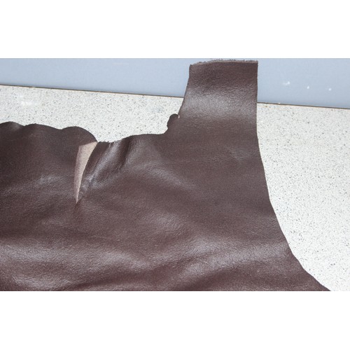 225 - Qty of leather offcuts, various thickness/shades of dark brown