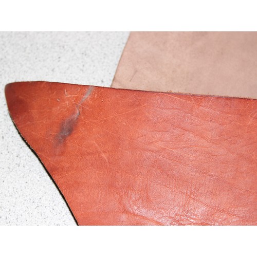 224 - Qty of leather offcuts of various thickness/shades of tan/brown