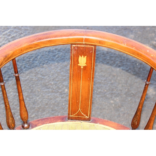 47 - An Edwardian Sheraton Revival mahogany horseshoe chair with inlaid Art Nouveau style decoration and ... 