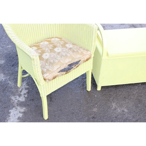 53 - A yellow painted Lloyd Loom style chair and ottoman, the ottoman approx 100cm wide x 37cm deep x 50c... 