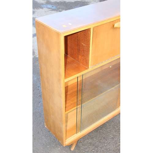 44 - An Avalon retro bookcase with glazed doors and small drop down bureau, approx 91cm wide x 28cm deep ... 