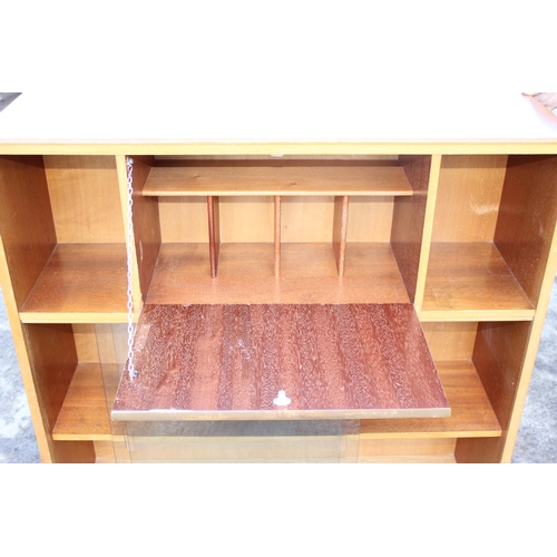 44 - An Avalon retro bookcase with glazed doors and small drop down bureau, approx 91cm wide x 28cm deep ... 