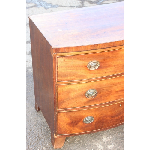 49 - A 19th century mahogany bow fronted 3 drawer chest of drawers with brass handles, approx 91cm wide x... 