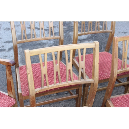 30 - A set of 6 retro dining chairs with red upholstered seats, 4 dining and 2 carver, seemingly unmarked