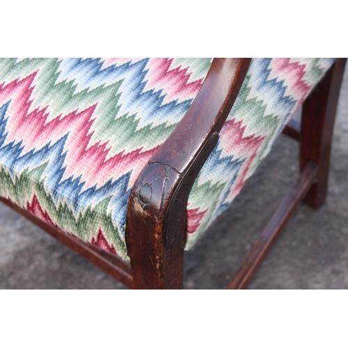 50 - An unusual Georgian mahogany armchair with later colourful upholstered seat