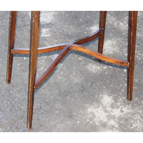 37 - An Edwardian Sheraton Revival mahogany side table with thin tapering legs and oval top, approx 53cm ... 