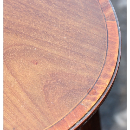 37 - An Edwardian Sheraton Revival mahogany side table with thin tapering legs and oval top, approx 53cm ... 