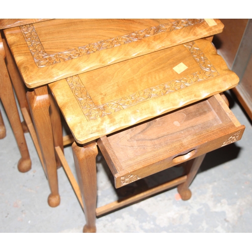 45A - A nest of 4 Indian carved wooden table, the largest approx 52cm wide x 33cm deep x 52cm tall