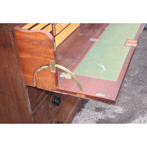 151 - A 19th century mahogany secretaire chest of drawers with turned wooden handles and bracket feet, app... 