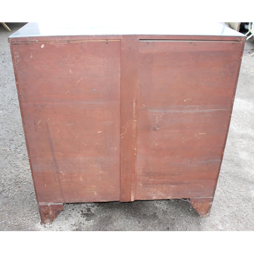 151 - A 19th century mahogany secretaire chest of drawers with turned wooden handles and bracket feet, app... 