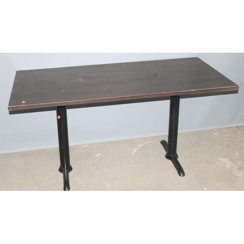 102A - A twin legged pub table, approx 151cm wide x 70cm deep x 75cm tall