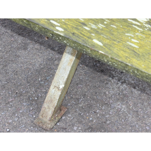 311 - A vintage weathered wooden garden picnic bench with metal frame, approx 183cm wide x 143cm deep x 72... 