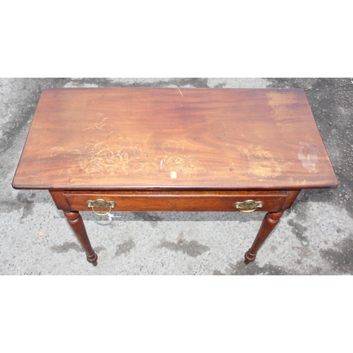 187 - A late 19th or early 20th century mahogany hall table with single drawer and Art Nouveau brass handl... 