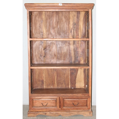 103 - A Dunelm Shesham Indian oak bookcase with 2 drawers and metal grill panels, original price tag of £3... 