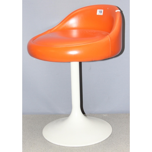 109 - In the manner of Borje Johanson, a small retro orange stool with tulip style metal base, approx 60cm... 