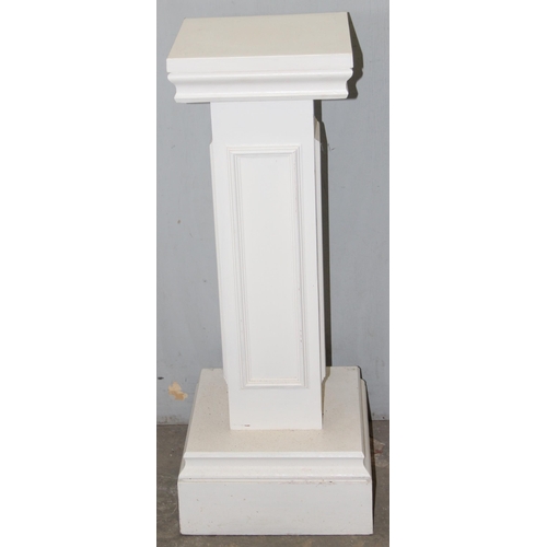 116 - A pair of white painted wooden display pillars or pedestals, each approx 31cm square x 80cm tall