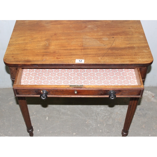 12 - In the manner of Gillows of Lancaster, a Regency period mahogany Chamber writing table, a mahogany t... 